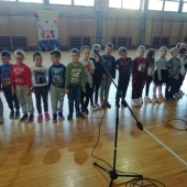 са медаљама добродошлице